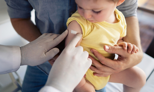 Infant vaccine flu shot.jpg