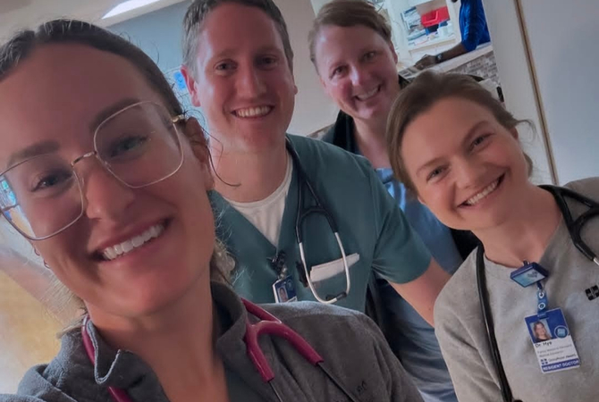 four family medicine residents smiling at camera.jpg
