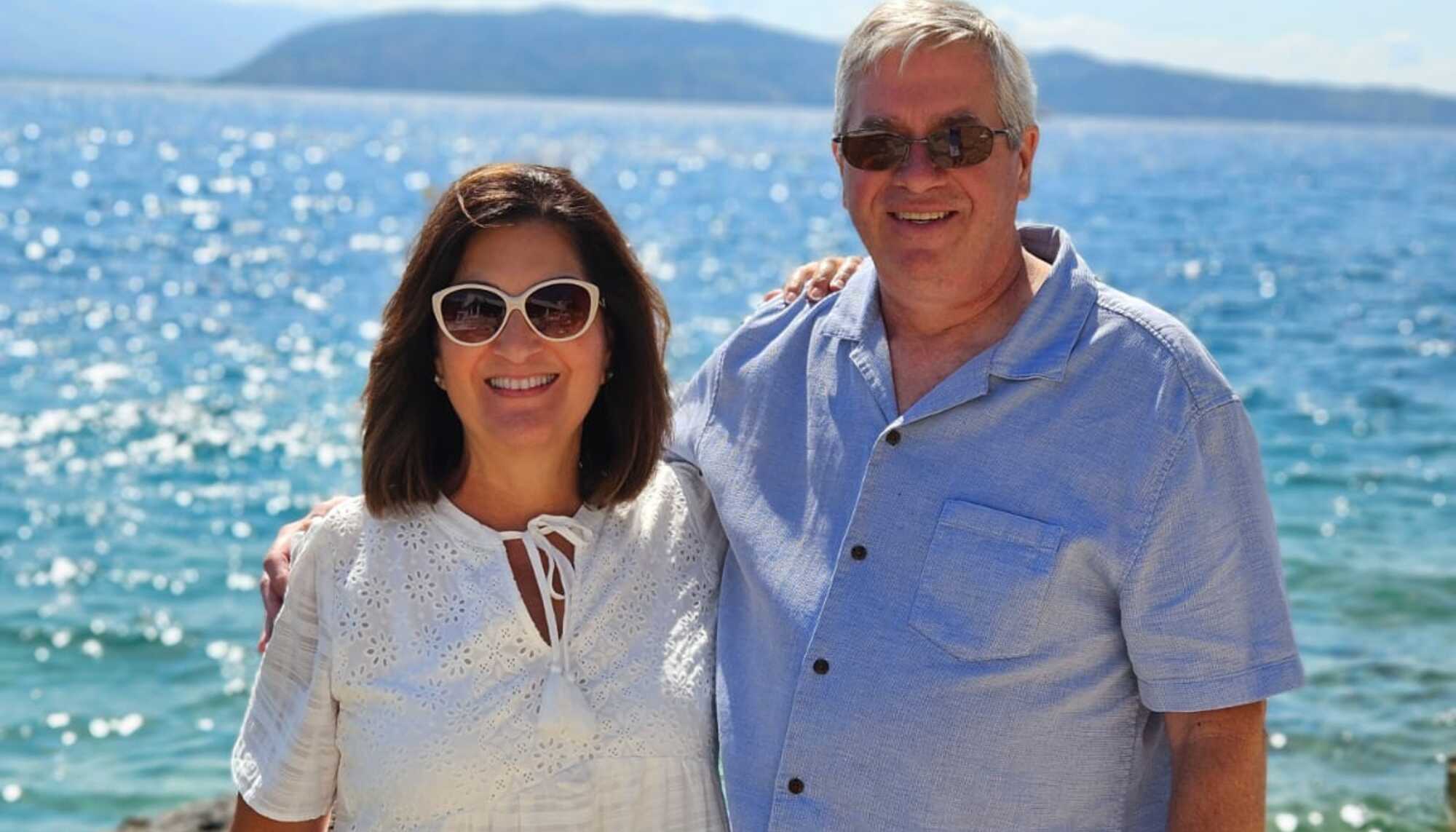 Chris and Bea Brasel standing in front of water.JPG