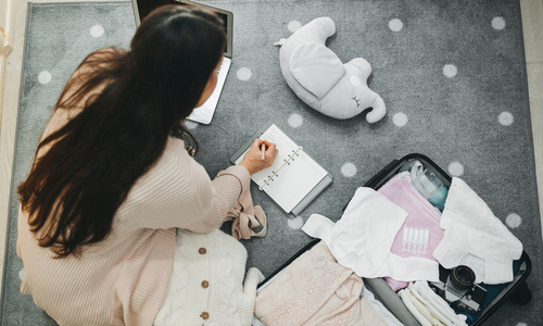 Mom packing baby hospital bag.jpg