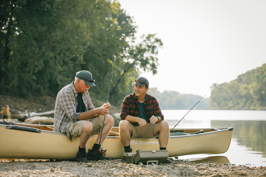 Two men sitting on fishing boat