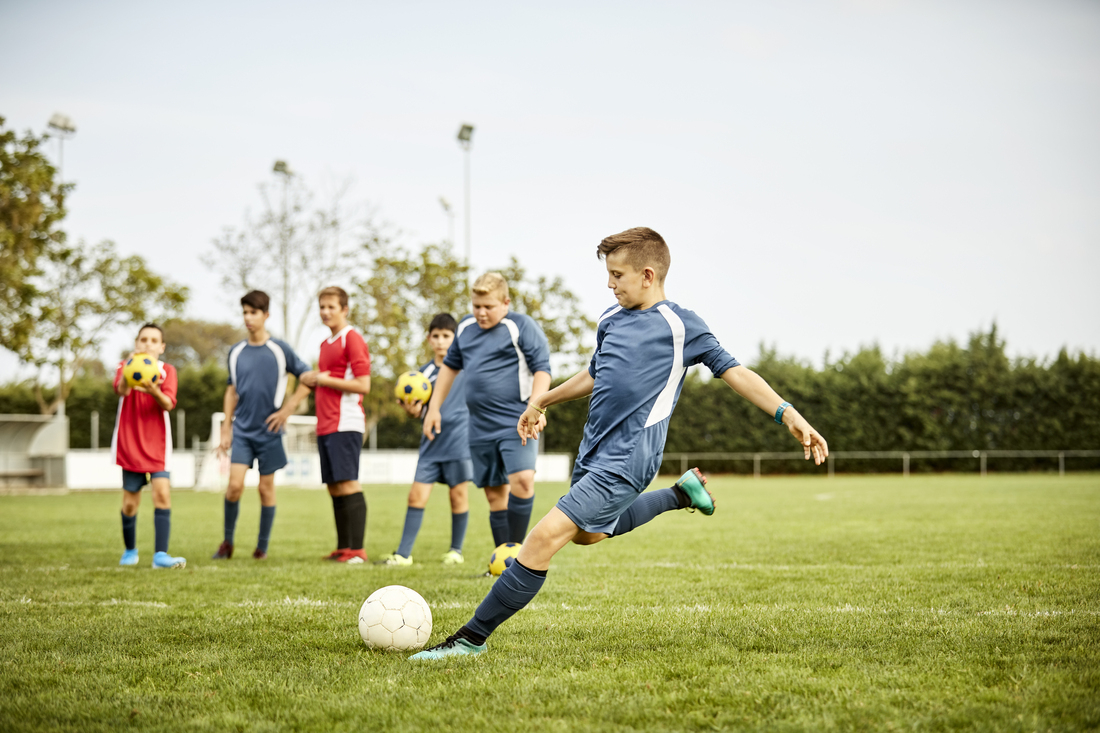 Children playing soccer