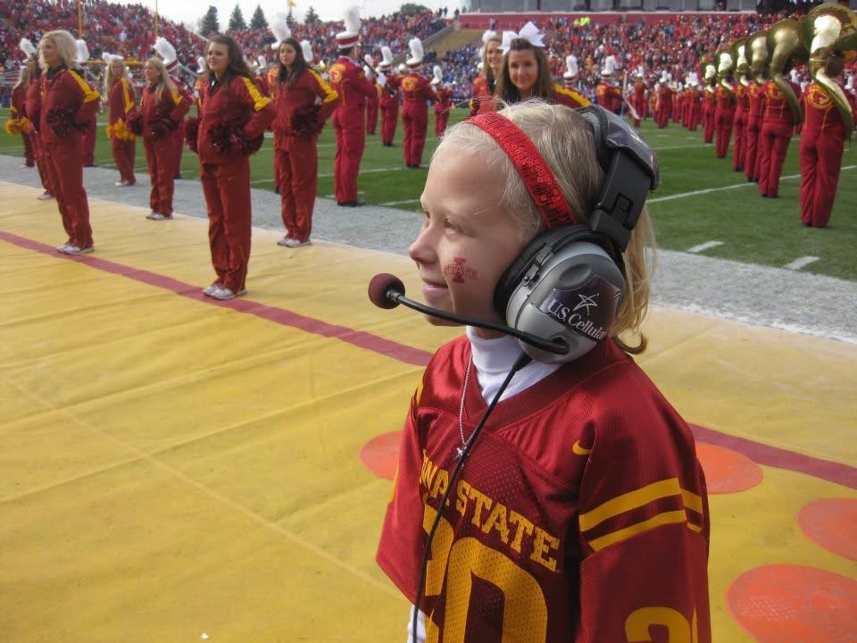 Jordan Iowa State Kid Captain at on field at football game