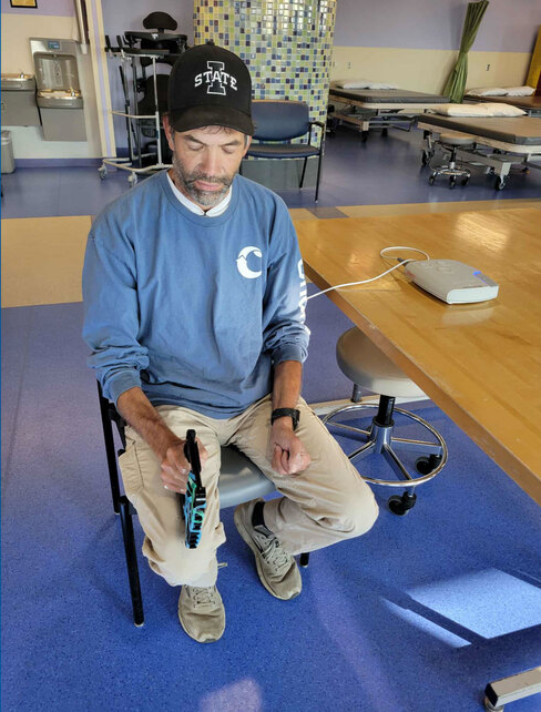 John Teske using ARC EX therapy device