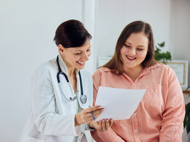 Doctor reviewing chart with patient.jpg