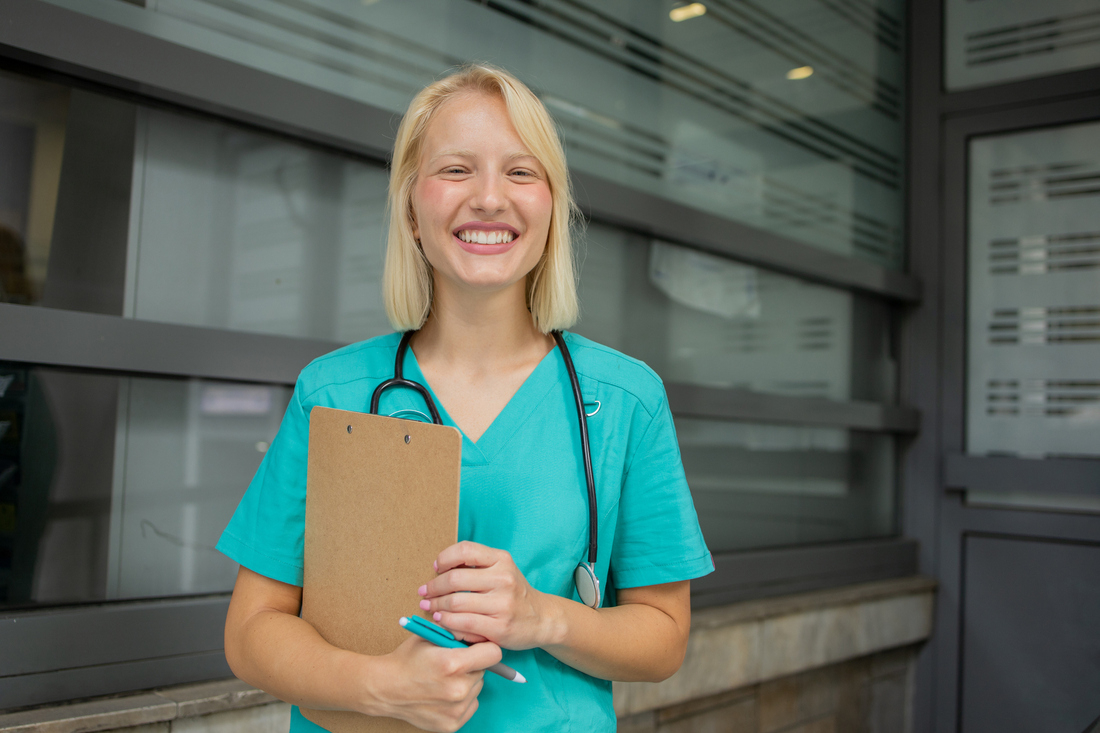 Young happy nurse smiling.jpg
