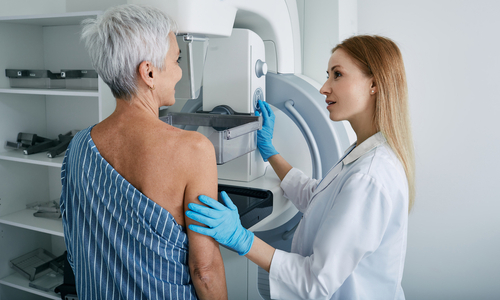 Woman getting a mammogram breast cancer screening.jpg