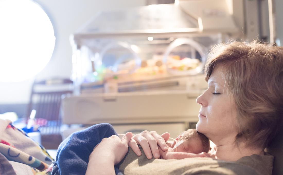 Mom holding baby in NICU.jpg