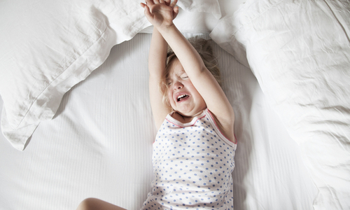 Child crying in bed.jpg