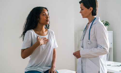 Woman holding heart.jpg