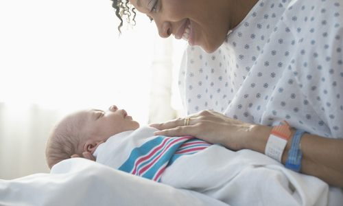 Mom looking down at newborn.jpg