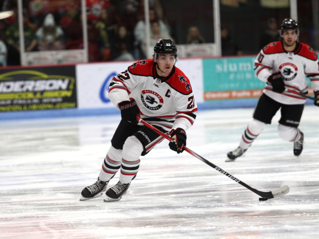 Myles Hilman playing hockey  -Stephanie Lyn Photography - UnityPoint Clinic Sports Medicine - United Medical Park patient testimonial