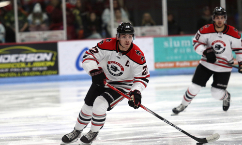 Myles Hilman playing hockey  -Stephanie Lyn Photography - UnityPoint Clinic Sports Medicine - United Medical Park patient testimonial