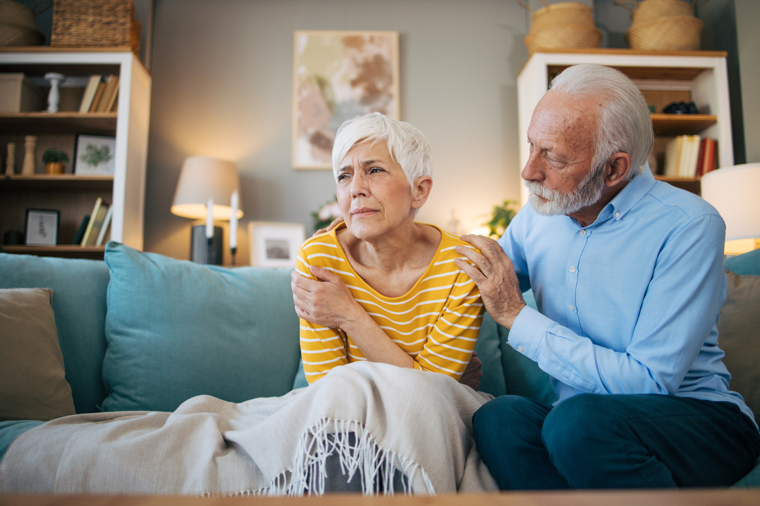 Sick senior woman on couch.jpg