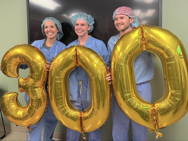 Allen Hospital OR team holding Balloons.jpeg