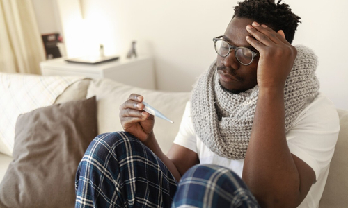 Man sick with fever.jpg