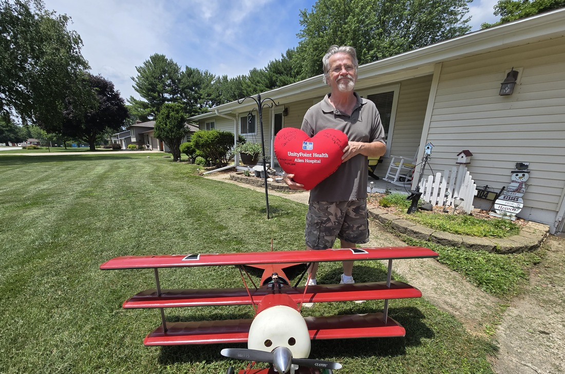 Randy Rogers with plane.jpg