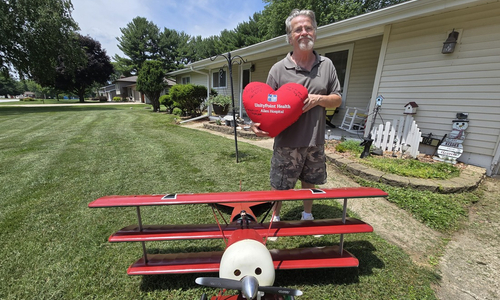 Randy Rogers with plane.jpg