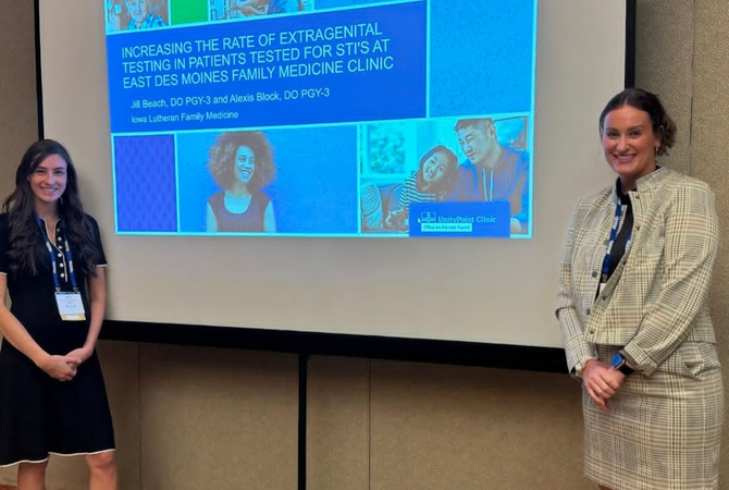 Family medicine residents presenting a powerpoint.jpg