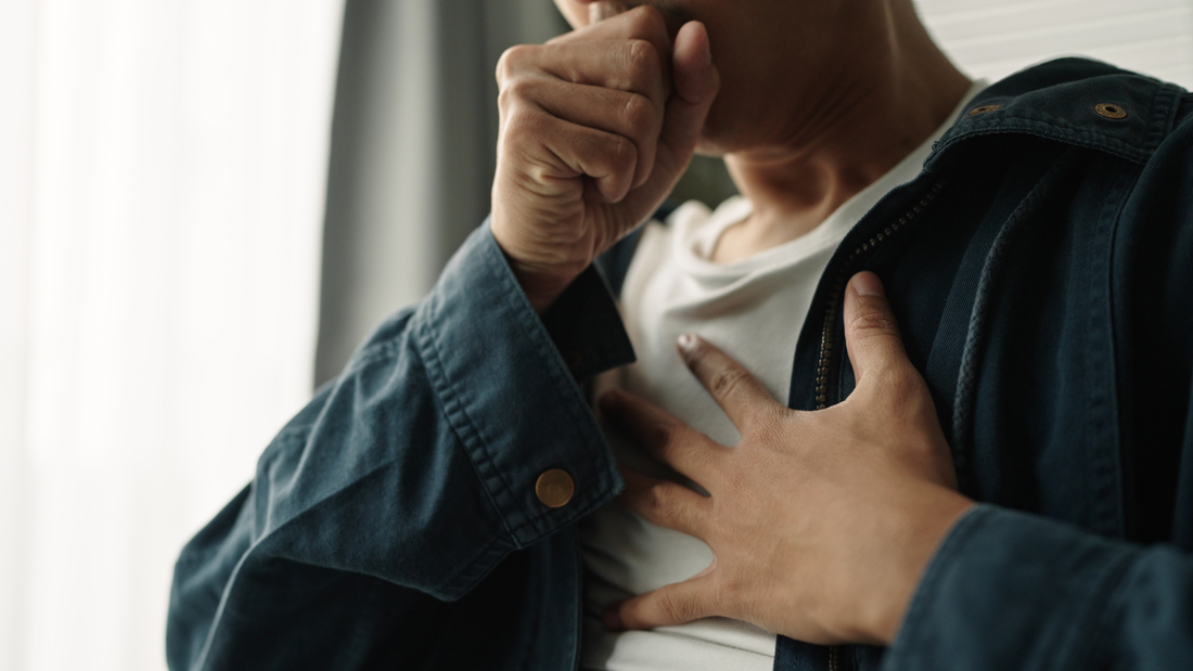 Woman covering mouth with hands.jpg
