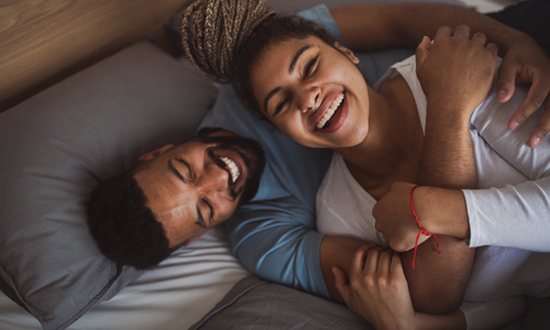 Couple cuddling in bed.jpg