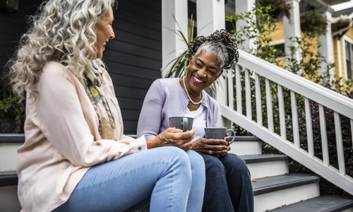 Two Women Sipping Coffee.jpg