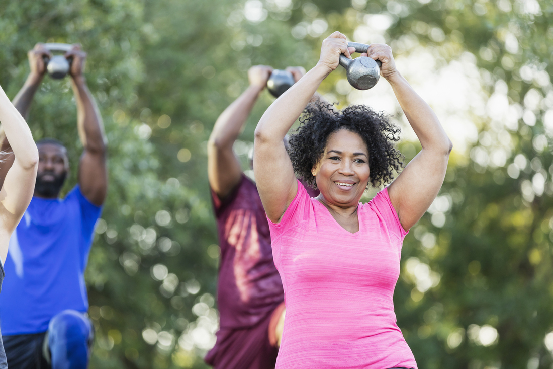 Woman in exercise class outdoors.jpg