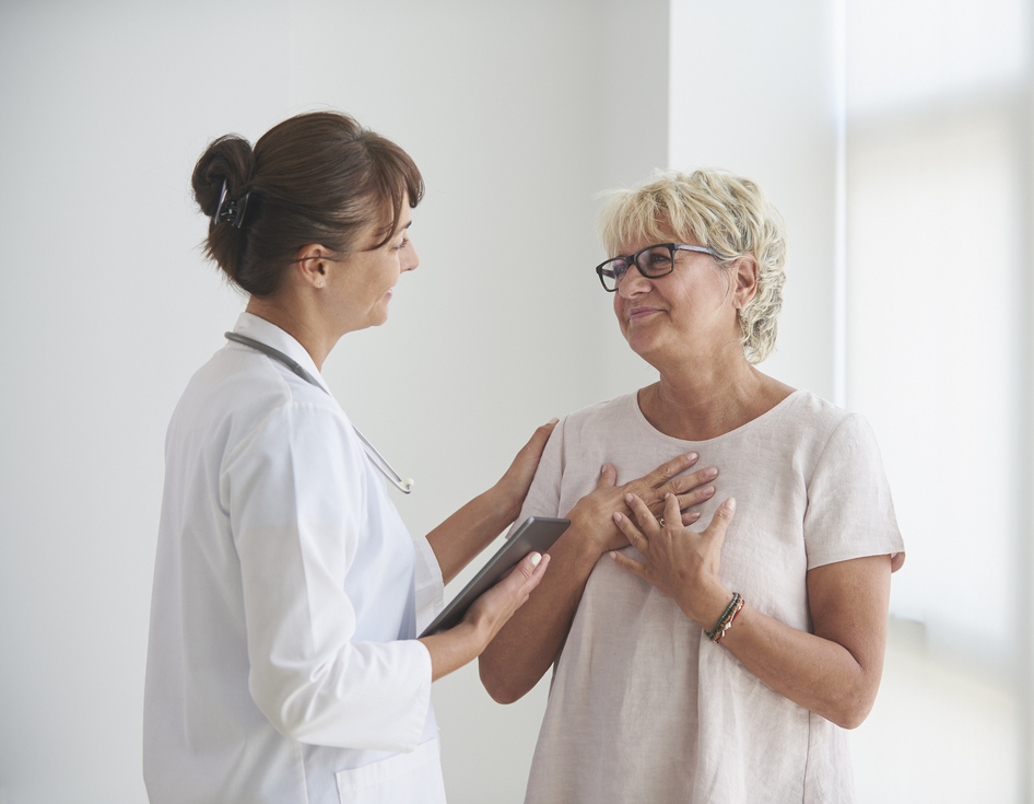 Female patient talking to doctor.jpg