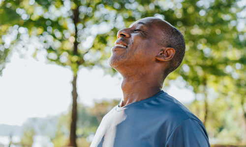 Happy man breathing outside.jpg