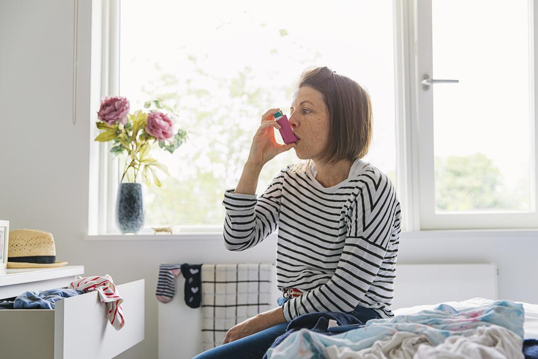 Woman with Asthma Inhaler.jpg