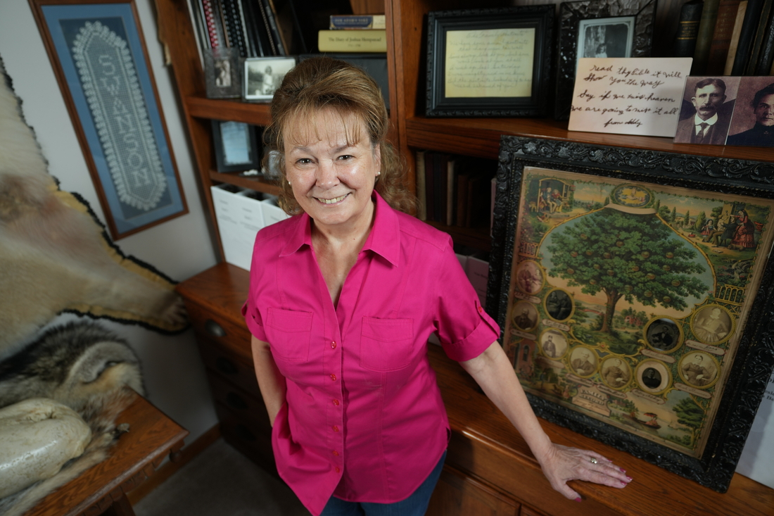 Lisa Swanson with family tree