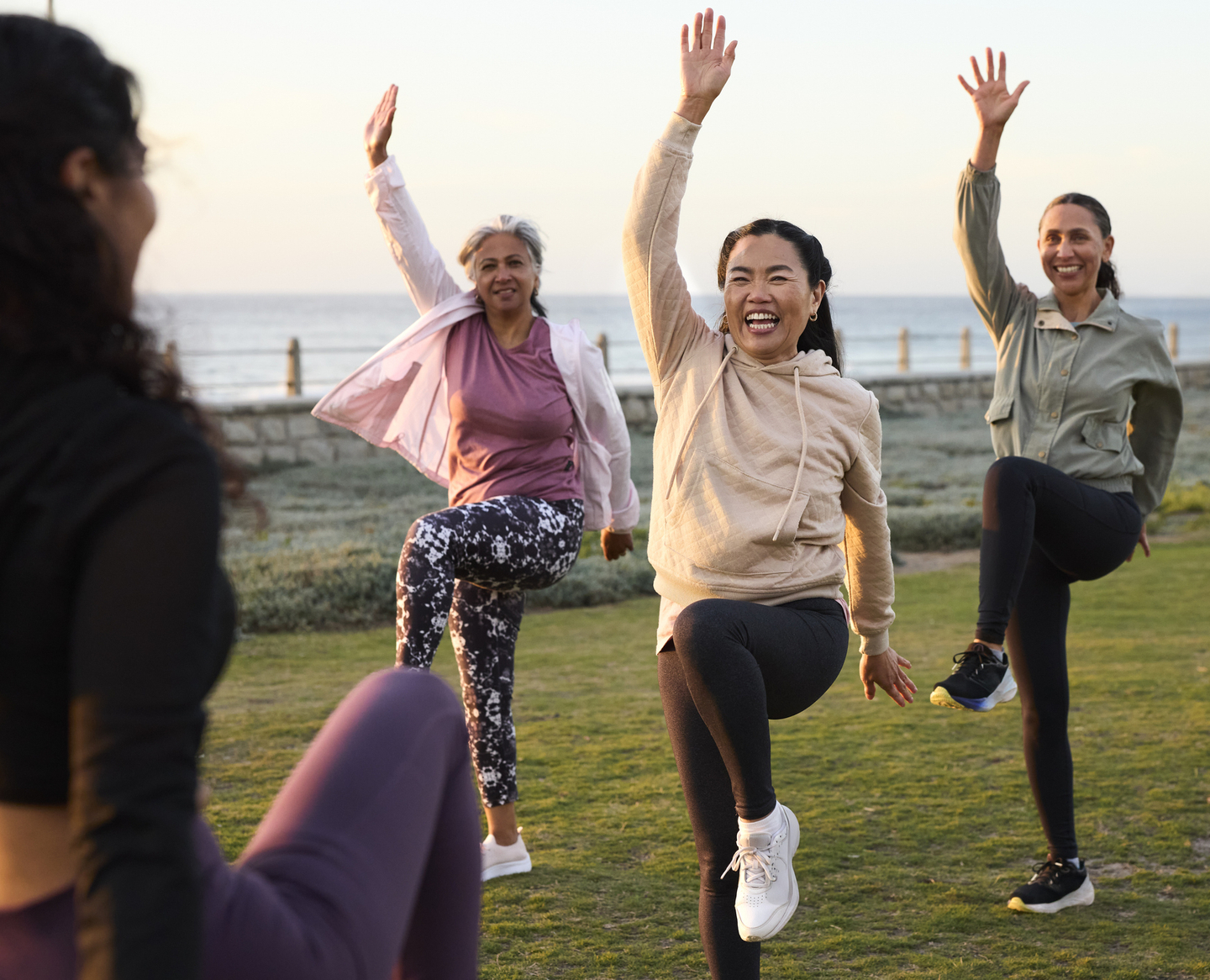 Happy women exercising outdoors.jpg