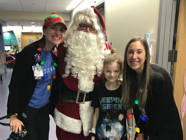 Emmie smiling with Santa - Blank Childrens Foundation.jpg