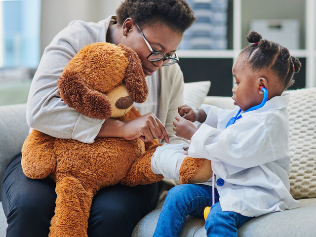 Child with toy stethoscope.jpg