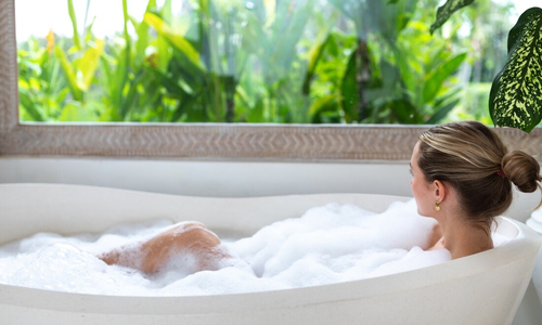 Woman taking bubble bath.jpg