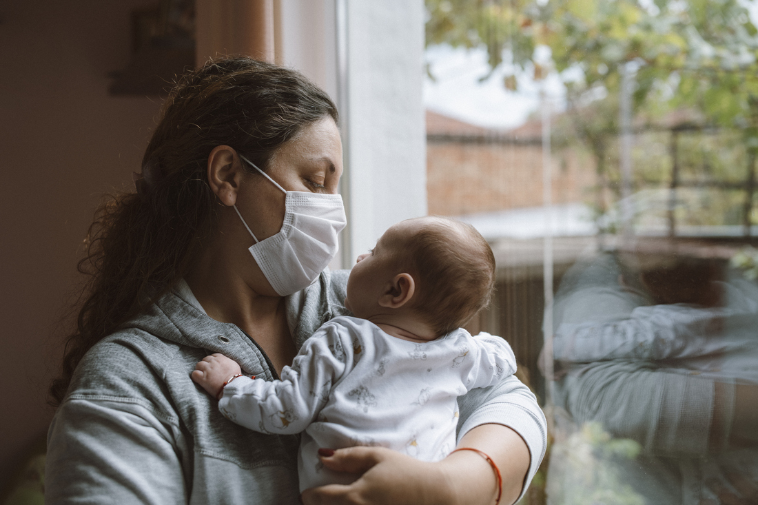 Masked mother with baby.jpg