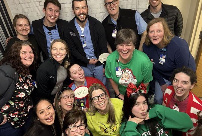 A group of residents at a Christmas party making funny faces at the camera..jpg