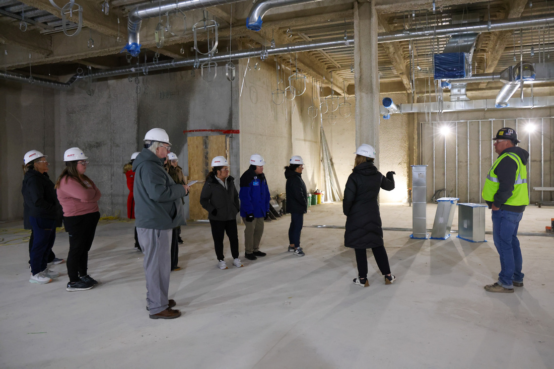 Team members and donors taking a tour of Fort Dodge surgery renovation and expansion space