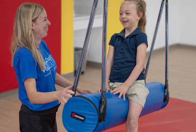 Girl using therapy equipment.jpg