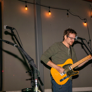 Chris Quave Playing Guitar 4.png