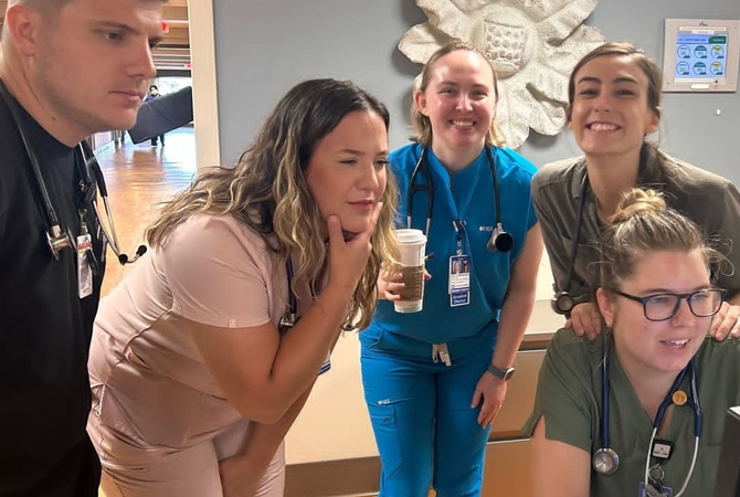 Family Medicine resident team looking at computer.jpg