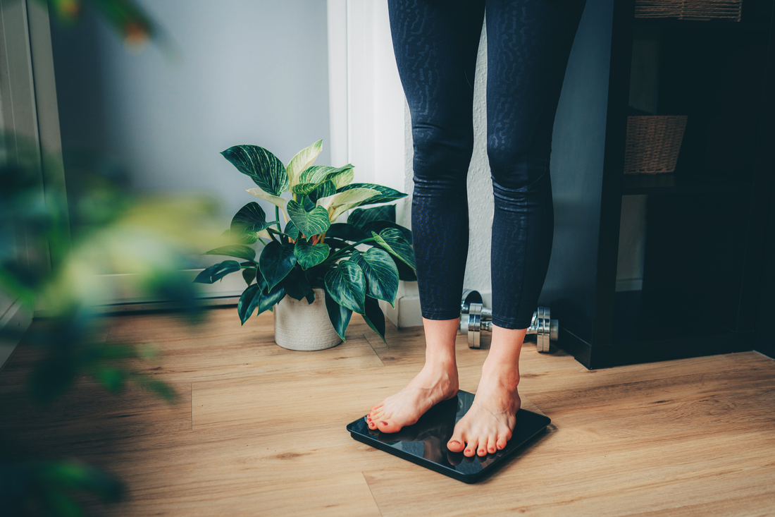 Feet standing on weight scale.jpg