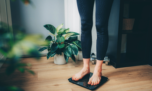 Feet standing on weight scale.jpg