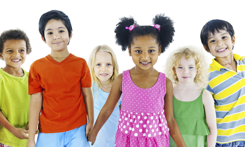 Children holdings hands smiling.jpg