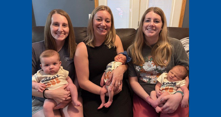 Three Dubuque sisters holding babies.jpg