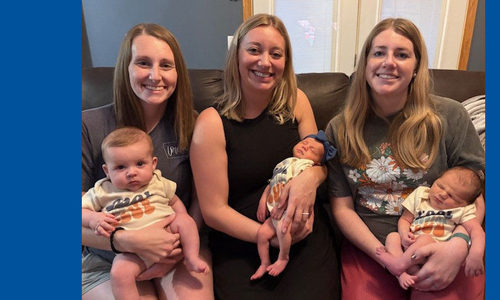 Three Dubuque sisters holding babies.jpg